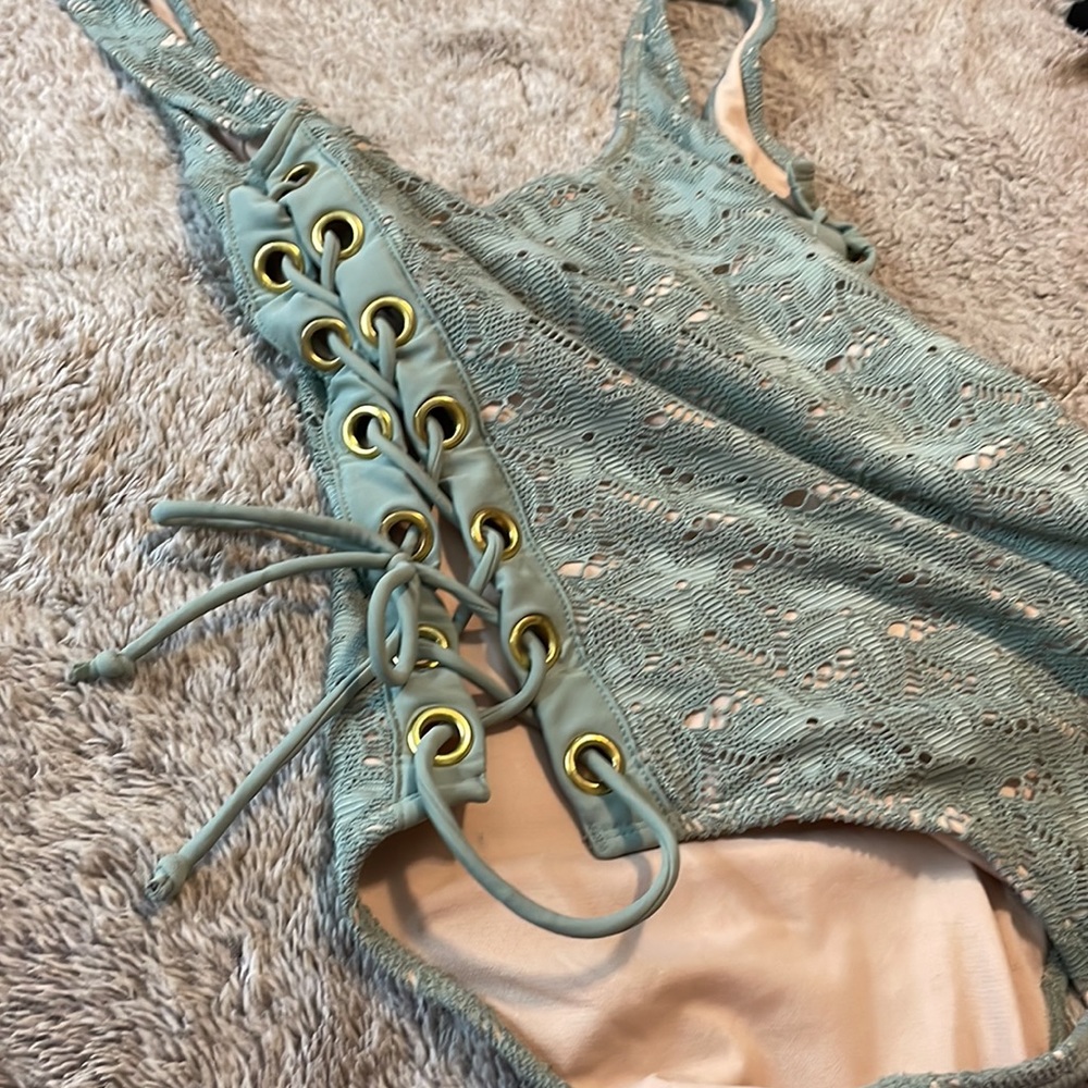 Tie up sides One Piece Swimsuit 🫶 - Picture 2 of 3